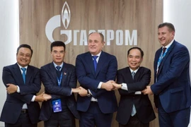 Руководители компаний PetroVietnam и «Газпром» Иллюстративное изображение (Фото: ВИА) 